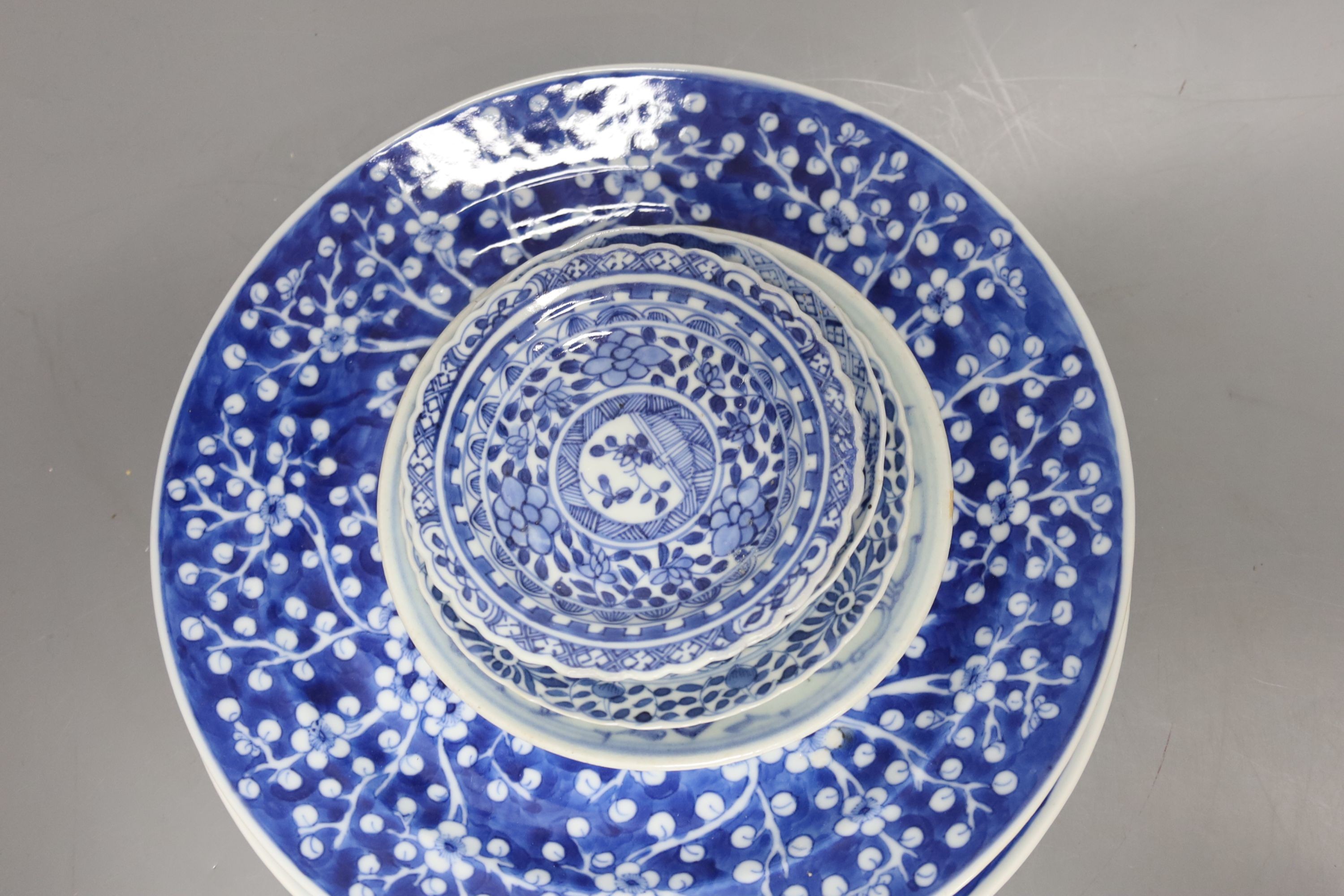 A group of 19th century Chinese blue and white plates, dishes and a cup